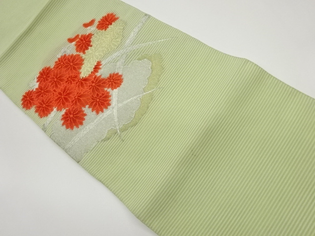 絽綴れ雲に菊・曲線模様織出し名古屋帯